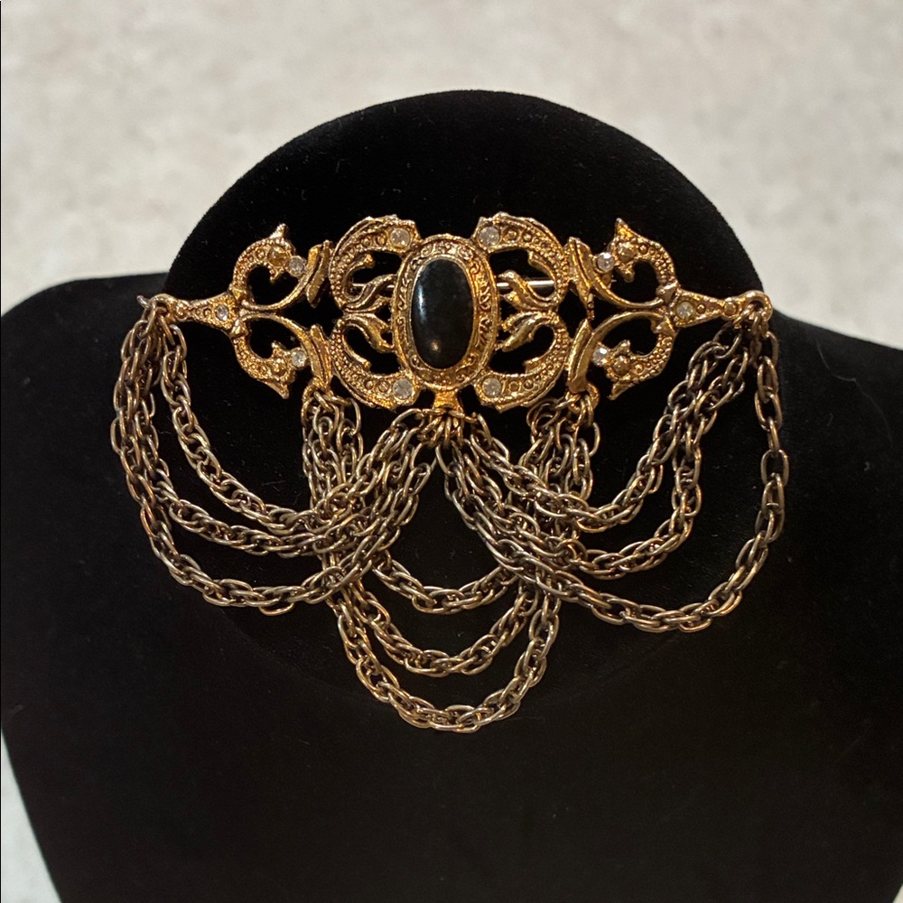 Elegant Gold and Black Chain Brooch